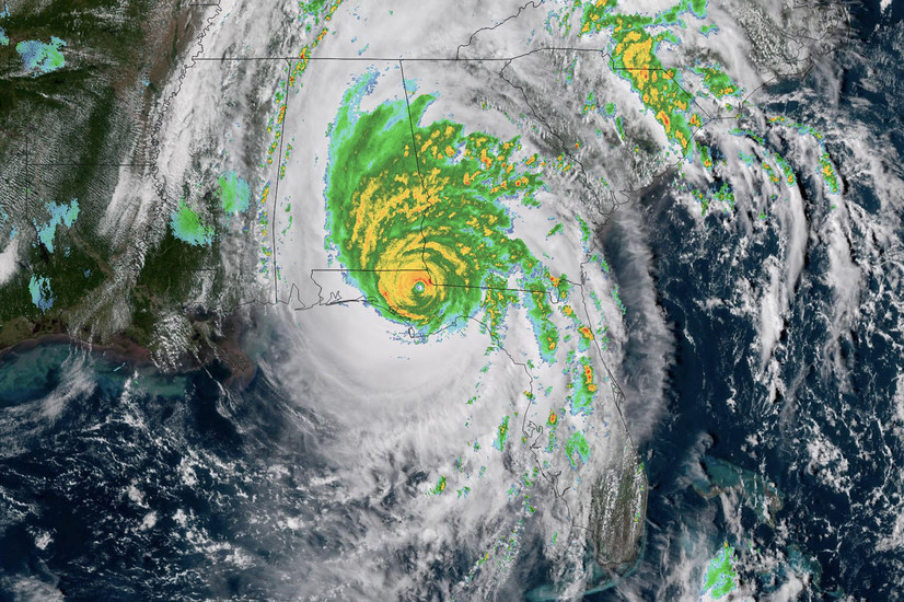 A satellite image from the National Oceanic and Atmospheric Administration taken at 3:30 p.m. EDT on Oct. 10, 2018, shows the position of Hurricane Michael over a map of the Florida panhandle.